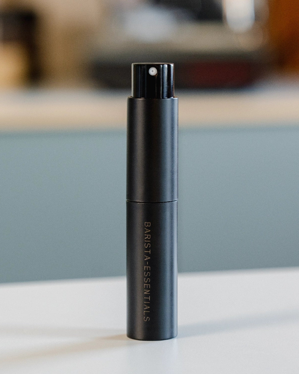 RDT spray bottle from Barista Essentials on worktop in home barista coffee corner